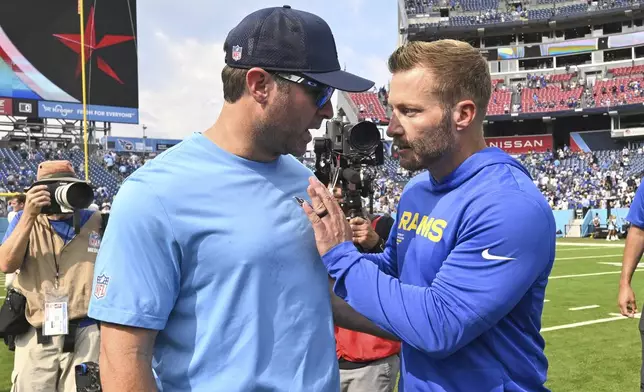 Tennessee Titans head coach Brian Callahan, left, and Los Angeles Rams head coach Sean McVay greet each other after the Rams defeated the Titans in an NFL football game Sunday, Sept. 14, 2025, in Nashville, Tenn. (AP Photo/John Amis)