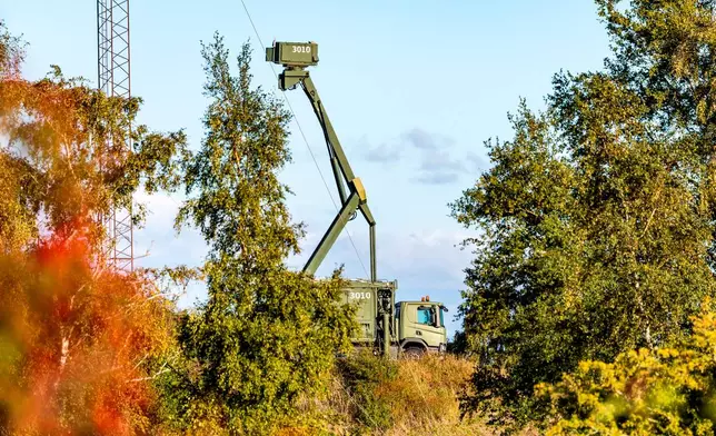 A mobile radar installation is seen at the Danish military site on Amager, Pionegaarden, near the village of Dragoer and on the coast of Oresund, the sea between Denmark and Sweden, on Friday, Sept. 26, 2025. (Steven Knap/Ritzau Scanpix via AP)