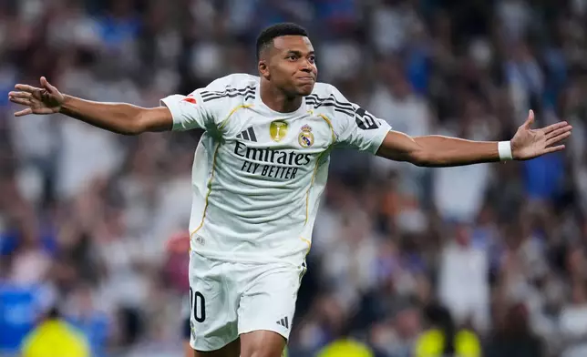 FILE - Real Madrid's Kylian Mbappe celebrates after scoring from a penalty kick during the La Liga soccer match between Real Madrid and Osasuna in Madrid, Spain, Tuesday, Aug. 19, 2025. (AP Photo/Manu Fernandez, File)