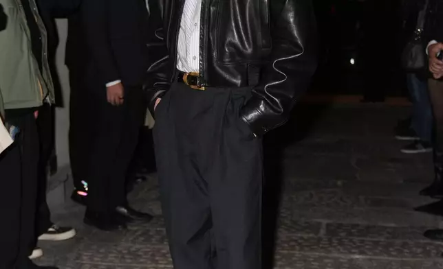 South Korean singer Hyunjin arrives for the Versace Intimate fashion event, in Milan, Friday, Sept. 26, 2025. (AP Photo/Antonio Calanni)