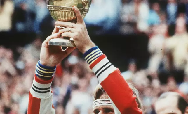 FILE - Sweden's tennis star Bjorn Borg gestures his elation after winning the match point in his final of the Mens' Singles, defeating John McEnroe to gain his fifth consecutive win in the annual Wimbledon championships. Borg's win is worth pounds 20.000 prize money. (AP-Photo/Adam Stoltman, File)