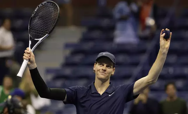 Jannik Sinner, of Italy, reacts after defeating Lorenzo Musetti, of Italy, during the quarterfinal round of the U.S. Open tennis championships, Wednesday, Sept. 3, 2025, in New York. (AP Photo/Adam Hunger)