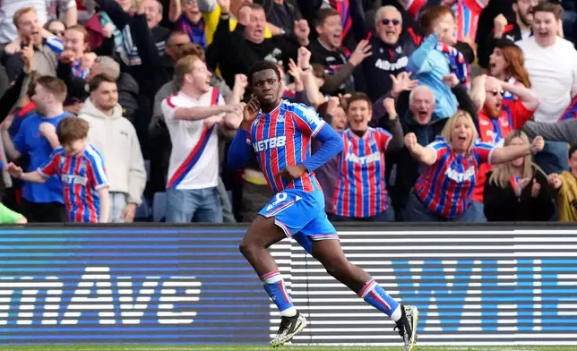 Crystal Palace's Eddie Nketiah celebrates scoring his side's second goal of the game, during the English Premier League soccer match between Crystal Palace and Liverpool, at Selhurst Park, in south London, Saturday, Sept. 27, 2025. (Jonathan Brady/PA via AP)