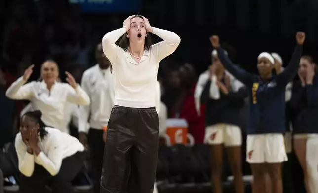 Indiana Fever guard Caitlin Clark reacts on a call by a referee during the second half of a WNBA basketball game against the Los Angeles Sparks, Friday, Aug. 29, 2025, in Los Angeles. (AP Photo/Kyusung Gong)