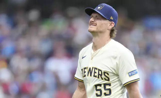 Milwaukee Brewers pitcher Shelby Miller reacts as he walks off the field during the eighth inning of a baseball game against the Philadelphia Phillies, Monday, Sept. 1, 2025, in Milwaukee. (AP Photo/Kayla Wolf)