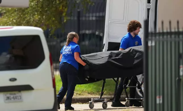 Police block off the street close to a U.S. Immigration and Customs Enforcement office after a reported shooting, in Dallas on Wednesday, Sept. 24, 2025. (AP Photo/Julio Cortez)