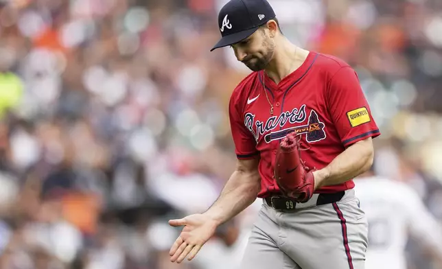 Atlanta Braves starting pitcher Spencer Strider celebrates after getting Detroit Tigers' Spencer Torkelson to strike out swinging to end the fifth inning of a baseball game, Sunday, Sept. 21, 2025, in Detroit. (AP Photo/Ryan Sun)