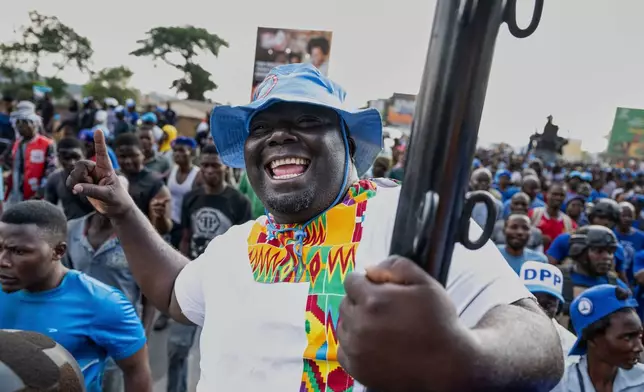 CAPTION CORRECTS PARTY SUPPORT - Supporters of former President Peter Mutharika celebrate in Blantyre, Malawi, Wednesday, Sept. 24, 2025. (AP Photo/Thoko Chikondi)