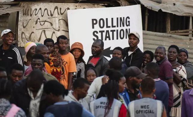 People line up to cast their votes in Blantyre, Malawi, Tuesday, Sept. 16, 2025. (AP Photo/Thoko Chikondi)