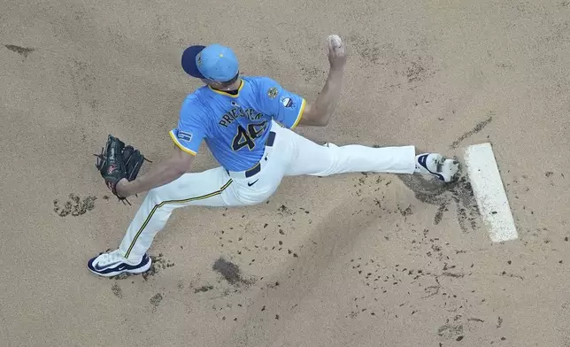 Milwaukee Brewers' Quinn Priester throws during the first inning of a baseball game against the St. Louis Cardinals Friday, Sept. 12, 2025, in Milwaukee. (AP Photo/Morry Gash)