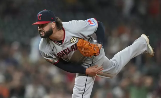 Cleveland Guardians pitcher Jakob Junis throws against the Detroit Tigers during the 10th inning of a baseball game Tuesday, Sept. 16, 2025, in Detroit. (AP Photo/Paul Sancya)