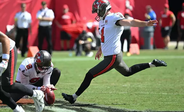 Tampa Bay Buccaneers kicker Chase McLaughlin (4) kicks a field goal during the second quarter of an NFL football game against the Philadelphia Eagles, Sunday, Sept. 28, 2025, in Tampa, Fla. (AP Photo/Jason Behnken)