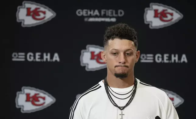 Kansas City Chiefs quarterback Patrick Mahomes speaks during a news conference following an NFL football game against the Philadelphia Eagles Sunday, Sept. 14, 2025, in Kansas City, Mo. (AP Photo/Charlie Riedel)
