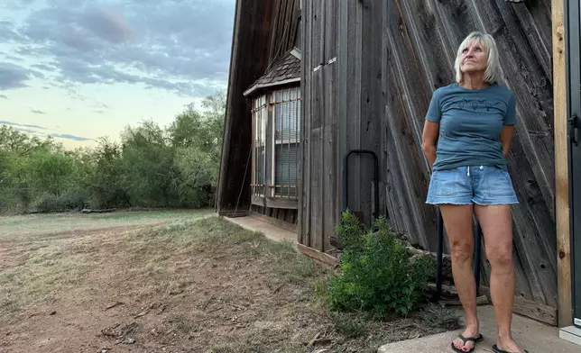 Arlene Mendler, who moved to a rural area north of Abilene, Texas more than 30 years ago for the natural setting, is photographed on Monday, Sept. 22, 2025. (AP Photo/Matt O'Brien)