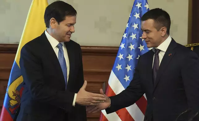 U.S. Secretary of State Marco Rubio and Ecuador's President Daniel Noboa shake hands at the presidential palace in Quito, Ecuador, Thursday, Sep. 4, 2025. (AP Photo/Jacquelyn Martin, pool)