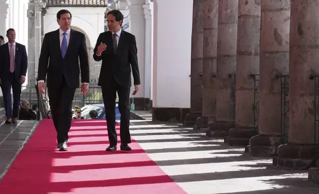 U.S. Secretary of State Marco Rubio, left, arrives to meet with Ecuador's President Daniel Noboa at the presidential palace in Quito, Ecuador, Thursday, Sep. 4, 2025. (AP Photo/Jacquelyn Martin, pool)