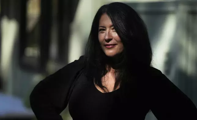 Ada Limón, 24th Poet Laureate of the United States, poses in Sonoma County, Calif., on Friday, Aug. 22, 2025. (AP Photo/Jeff Chiu)