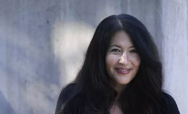 Ada Limón, 24th Poet Laureate of the United States, poses in Sonoma County, Calif., on Friday, Aug. 22, 2025. (AP Photo/Jeff Chiu)