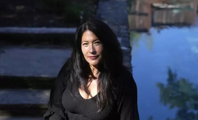 Ada Limón, 24th Poet Laureate of the United States, poses in Sonoma County, Calif., on Friday, Aug. 22, 2025. (AP Photo/Jeff Chiu)