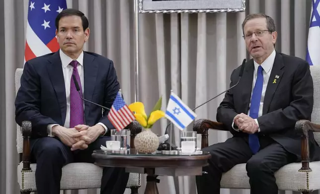 U.S. Secretary of State Marco Rubio and Israeli President Isaac Herzog meet at the Beit Hanassi presidential residence, during Rubio's visit, in Jerusalem, Monday, Sept. 15, 2025. (Nathan Howard/Pool Photo via AP)
