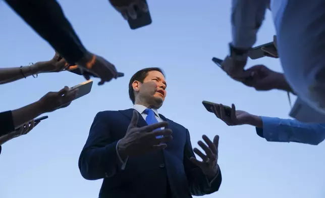 U.S. Secretary of State Marco Rubio speaks to media at Ben Gurion International Airport, as he departs Tel Aviv for Qatar following an official visit, near Lod, Israel, Tuesday, Sept. 16, 2025. (Nathan Howard/Pool Photo via AP)