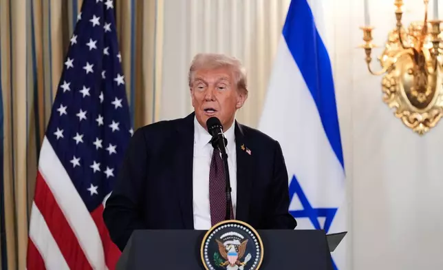 President Donald Trump speaks during a news conference with Israel's Prime Minister Benjamin Netanyahu in the State Dining Room of the White House, Monday, Sept. 29, 2025, in Washington. (AP Photo/Alex Brandon)