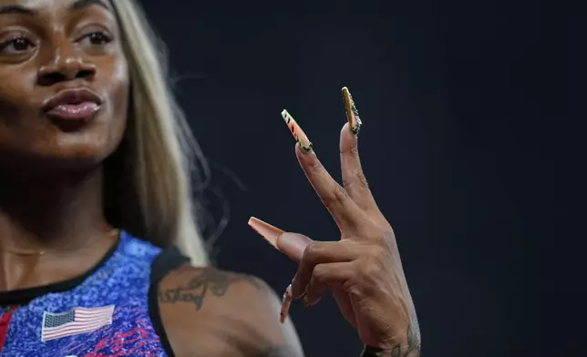 United States' Sha'Carri Richardson gestures after a women's 4 X 100 meters relay heat at the World Athletics Championships in Tokyo, Saturday, Sept. 20, 2025. (AP Photo/Petr David Josek)