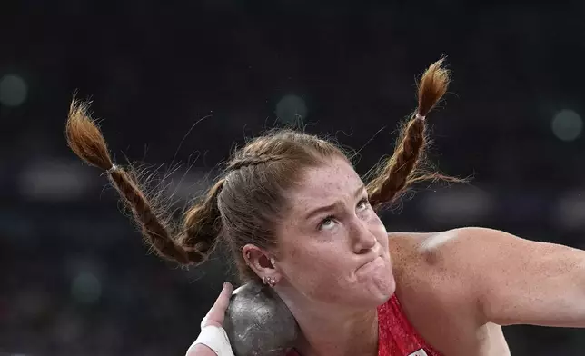 Canada's Sarah Mitton makes an attempt in the women's shot put final at the World Athletics Championships in Tokyo, Saturday, Sept. 20, 2025. (AP Photo/Matthias Schrader)
