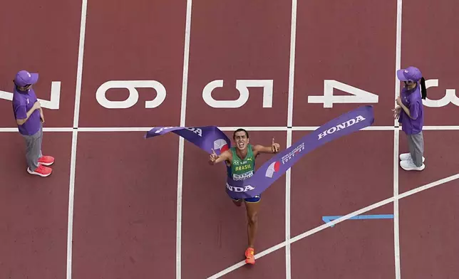 Brazil's Caio Bonfim wins the men's 20 kilometers race walk at the World Athletics Championships in Tokyo, Saturday, Sept. 20, 2025. (AP Photo/Bernat Armangue)