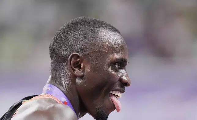 Kenya's Emmanuel Wanyonyi reacts after winning the men's 800 meters final at the World Athletics Championships in Tokyo, Saturday, Sept. 20, 2025. (AP Photo/Eugene Hoshiko)