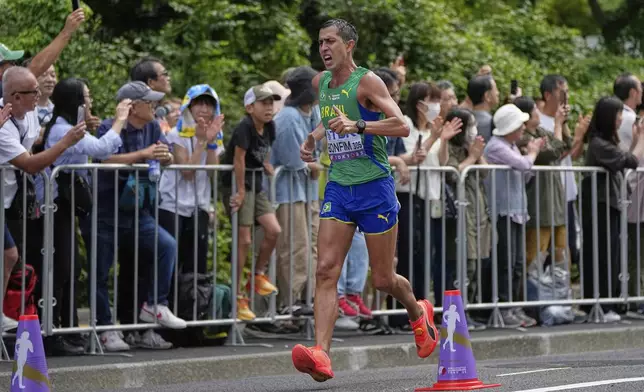 Brazil's Caio Bonfim on his way to winning the gold medal in the men's 20 kilometers race walk at the World Athletics Championships in Tokyo, Saturday, Sept. 20, 2025. (AP Photo/Abbie Parr)