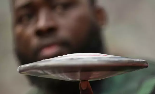 Jamaica's Chad Wright prepares to compete in the men's discus throw qualification at the World Athletics Championships in Tokyo, Saturday, Sept. 20, 2025. (AP Photo/Ashley Landis)