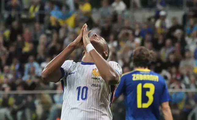 France's Kylian Mbappe reacts after missing a scoring chance during the 2026 FIFA World Cup qualifying soccer match between Ukraine and France at Tarczynski Arena in Wroclaw, Poland, Friday, Sept. 5, 2025. (AP Photo/Czarek Sokolowski)
