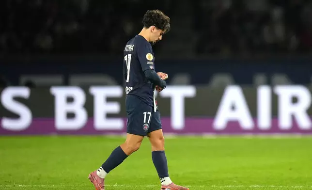 PSG's Vitinha walks off the pitch to be substituted during the French League One soccer match between Paris Saint-Germain and Auxerre at the Parc des Princes in Paris, Saturday, Sept. 27, 2025. (AP Photo/Thibault Camus)