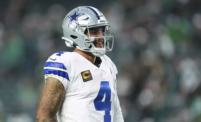 Dallas Cowboys quarterback Dak Prescott warms up before an NFL football game against the Philadelphia Eagles Thursday, Sept. 4, 2025, in Philadelphia. (AP Photo/Matt Rourke)