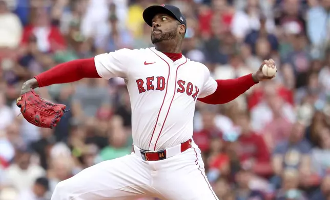 Boston Red Sox pitcher Aroldis Chapman throws during the ninth inning of a baseball game against the Cleveland Guardians, Monday, Sept. 1, 2025, in Boston. (AP Photo/Mark Stockwell)