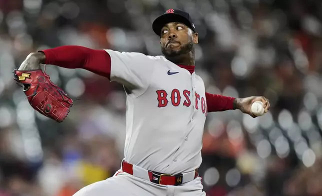 Boston Red Sox relief pitcher Aroldis Chapman delivers during the ninth inning of a baseball game against the Baltimore Orioles, Wednesday, Aug. 27, 2025, in Baltimore. (AP Photo/Stephanie Scarbrough)