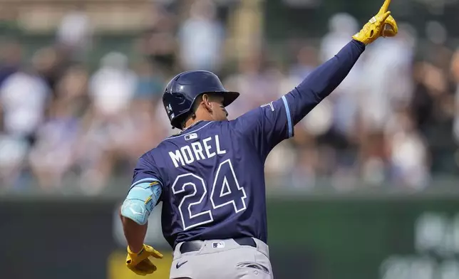 Tampa Bay Rays designated hitter Christopher Morel (24) runs the bases after hitting a three-run home run during the first inning of a baseball game against the Chicago Cubs, Friday, Sept. 12, 2025, in Chicago. (AP Photo/Erin Hooley)