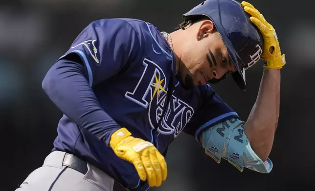 Tampa Bay Rays designated hitter Christopher Morel (24) runs the bases after hitting a three-run home run during the first inning of a baseball game against the Chicago Cubs, Friday, Sept. 12, 2025, in Chicago. (AP Photo/Erin Hooley)