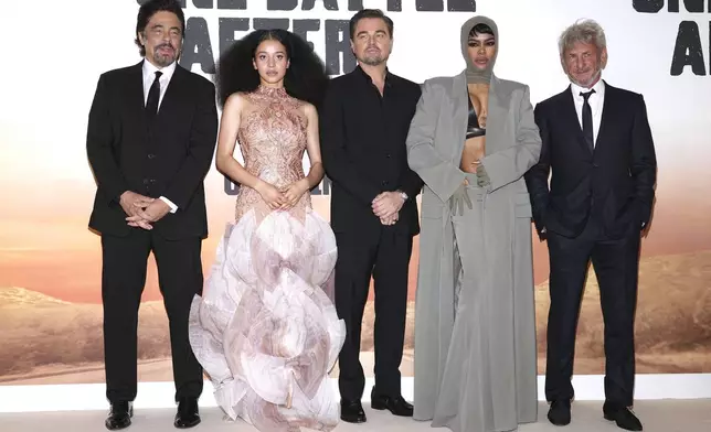 Benicio Del Toro, from left, Chase Infiniti, Leonardo DiCaprio, Teyana Taylor and Sean Penn pose for photographers upon arrival at the premiere of the film 'One Battle After Another' on Tuesday, Sept. 16, 2025, in London. (Photo by Scott A Garfitt/Invision/AP)