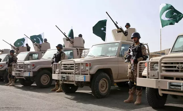 FILE - In this Monday, March 30, 2015 file photo provided by the Saudi Press Agency (SPA), Royal Saudi Land Forces and units of Special Forces of the Pakistani army take part in a joint military exercise called "Al-Samsam 5" in Shamrakh field, north of Baha region, southwest Saudi Arabia. (AP Photo/SPA, File)