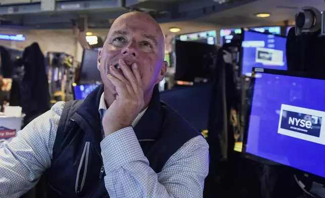 Specialist John O'Hara works at his post on the floor of the New York Stock Exchange, Monday, Sept. 15, 2025. (AP Photo/Richard Drew)