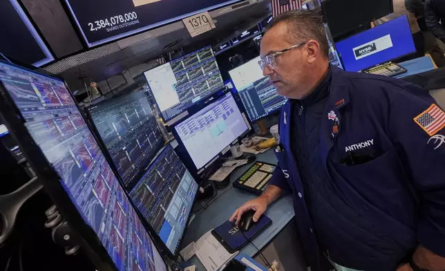 Specialist Anthony Matesic works at his post on the floor of the New York Stock Exchange, Monday, Sept. 15, 2025. (AP Photo/Richard Drew)