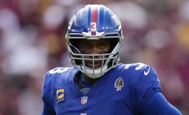 New York Giants quarterback Russell Wilson (3) on the field near the end of the second half of an NFL football game against the Washington Commanders, Sunday, Sept. 7, 2025, in Landover, Md. Commanders won 21-6. (AP Photo/Stephanie Scarbrough)