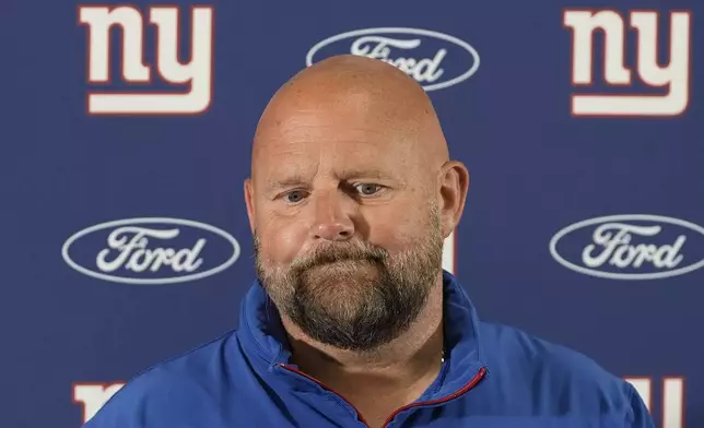 New York Giants head coach Brian Daboll speaking to members of the media after the end of an NFL football game, Sunday, Sept. 7, 2025, in Landover, Md. Commanders won 21-6. (AP Photo/Stephanie Scarbrough)