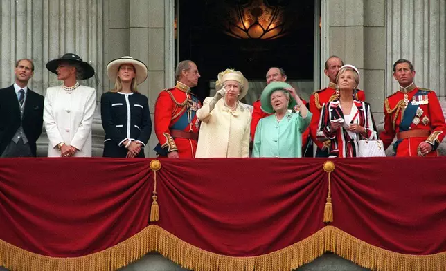 FILE - Britain's Queen Elizabeth II, centre, stands on the balcony of Buckingham Palace with other members of the royal family, including Katherine, Duchess of Kent, second from right, to mark the occasion of her official birthday, Saturday, June 14, 1997. (AP Photo/David Thomson, File)