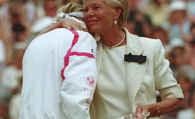 FILE - Jana Novotna is consoled by Katherine, Duchess of Kent, after the Ladies Singles final on the Centre Court at Wimbledon, England, July 3, 1993. (AP Photo/Denis Paquin, File)