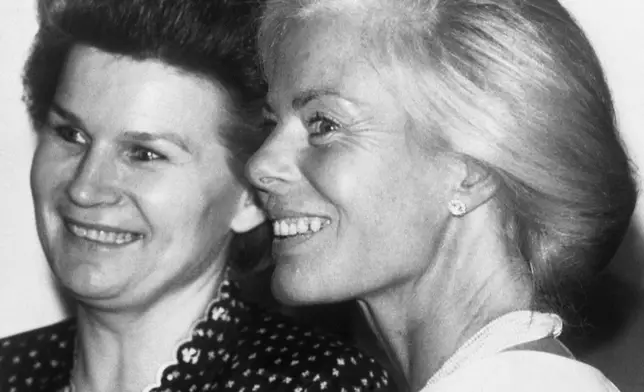 FILE - Britain's Katherine, Duchess of Kent, right, and Valentina Tereshkova, the first woman in space, and then President of the Soviet Women's Committee, chat together at the Women of the Year luncheon, at London's Savoy Hotel on Oct. 22, 1984. (AP Photo/John Redman, file)