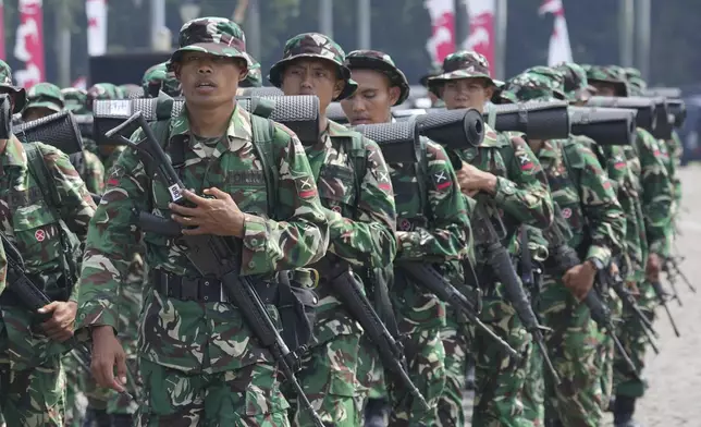 Indonesian soldiers are deployed following days of violent protests against lawmakers’ perks and privileges, in Jakarta, Indonesia, Monday, Sept. 1, 2025. (AP Photo/Tatan Syuflana)