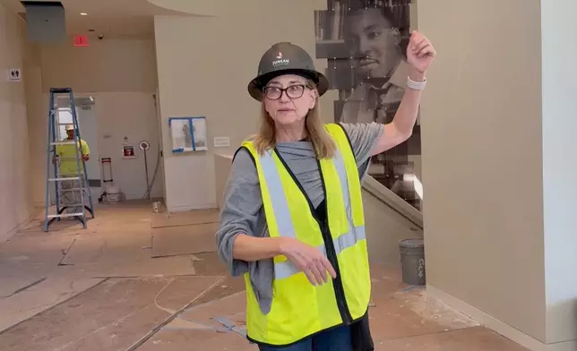Jill Savitt, President and CEO of the National Center for Civil and Human Rights in Atlanta, leads a hard-hat tour of the expanded museum before its November reopening on Wednesday, Sept. 10, 2025. (AP Photo/Michael Warren)